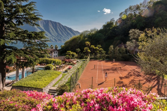 Stay, Play, Repeat: 7+1 Hotels with Clay Tennis Courts You Won’t Forget